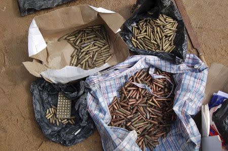 Confiscated ammunition is displayed after a Nigerian military raid on a hideout of suspected Islamist Boko Haram members in Nigeria's northern city of Kano in this August 11, 2012 file photo. REUTERS/Stringer/Files