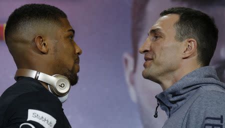 Britain Boxing - Anthony Joshua & Wladimir Klitschko Press Conference - Sky Central - 27/4/17 Anthony Joshua and Wladimir Klitschko pose during the press conference Action Images via Reuters / Andrew Couldridge Livepic