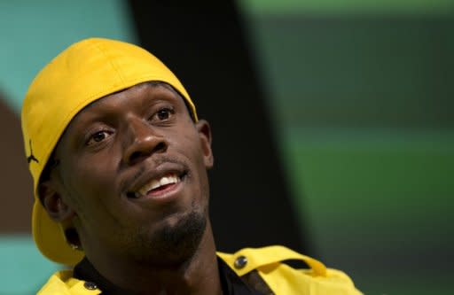 Jamaica's Usain Bolt, pictured during a press conference ahead of the London 2012 Summer Olympics, on July 26. The huge interest in men's 100m in large part comes down to the role played in the resurgence of athletics on a global level by Bolt, who won treble gold at the Beijing Games, notably the 100m and 200m, in then-world record times