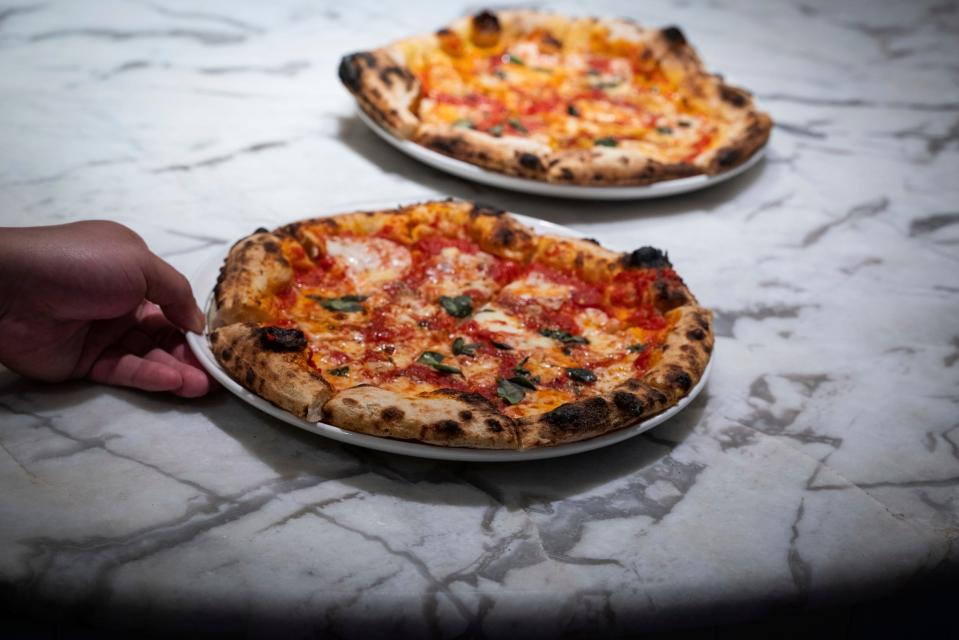 Margherita pizza is served during the third annual EAT Detroit event that benefits SAY Detroit charities at Mad Nice, a modern Italian restaurant, in Midtown Detroit on Tuesday, June 27, 2023.