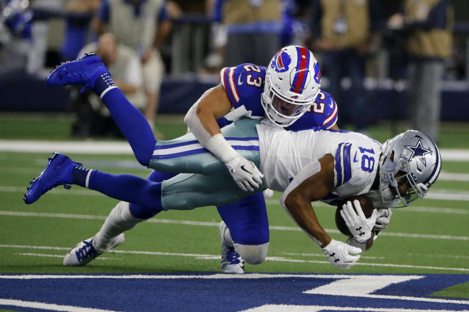 Buffalo Bills safety Micah Hyde (23) makes the stop after Dallas Cowboys wide receiver Randall Cobb (18) caught a pass in the second half of an NFL football game in Arlington, Texas, Thursday, Nov. 28, 2019. (AP Photo/Michael Ainsworth)