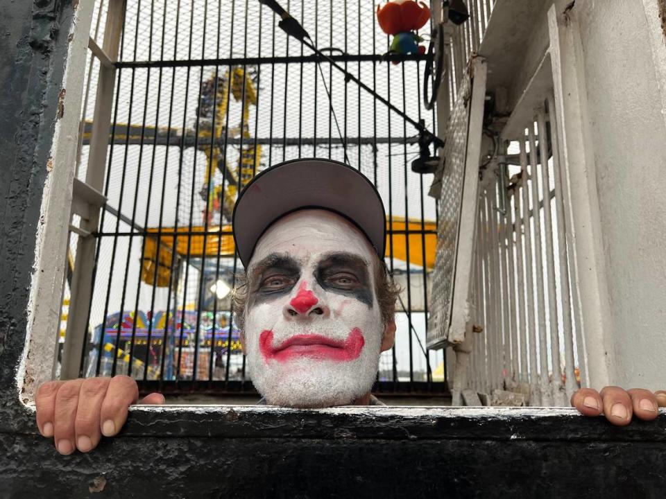 Sam Degristina, 52, a dunking-booth clown at the Soak The Bloke game at the Georgia National Fair in Perry.