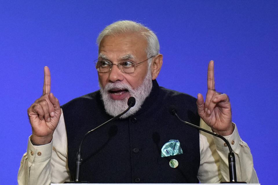 India's Prime Minister Narendra Modi presents his national statement as part of the World Leaders' Summit of the COP26 UN Climate Change Conference in Glasgow, Scotland on November 1, 2021. - COP26, running from October 31 to November 12 in Glasgow will be the biggest climate conference since the 2015 Paris summit and is seen as crucial in setting worldwide emission targets to slow global warming, as well as firming up other key commitments. (Photo by Alastair Grant / POOL / AFP) (Photo by ALASTAIR GRANT/POOL/AFP via Getty Images)