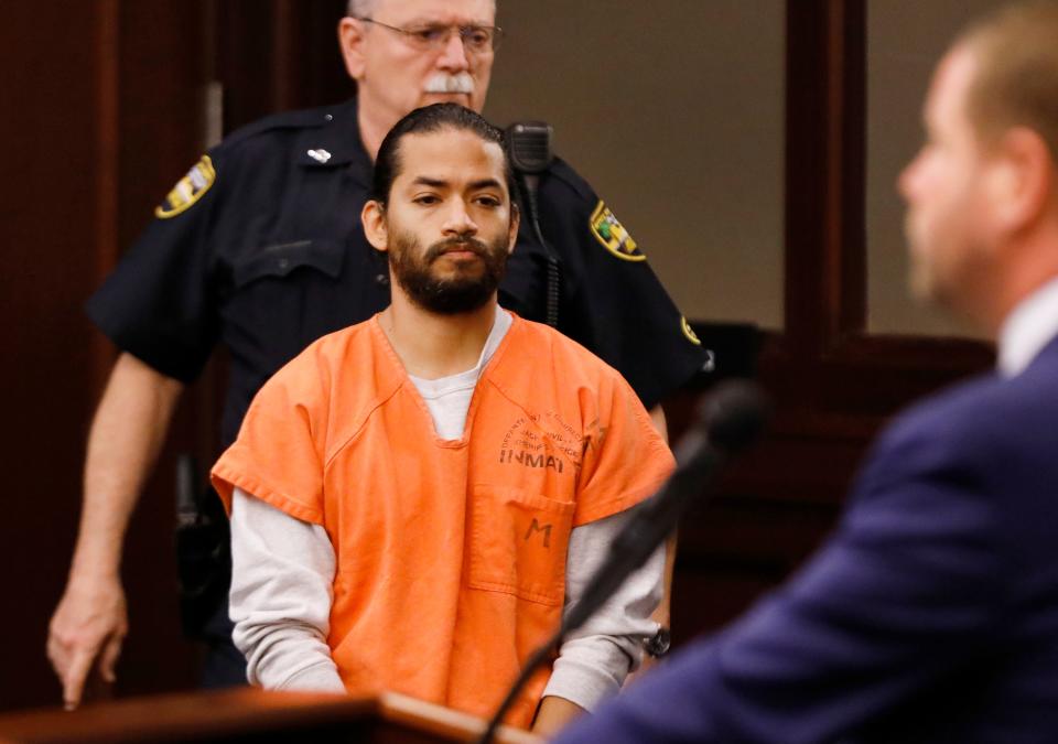 Mario Fernandez Saldana is led into a Duval County courtroom on April 4 to face charges in the Jared Bridegan murder case in Jacksonville Beach.