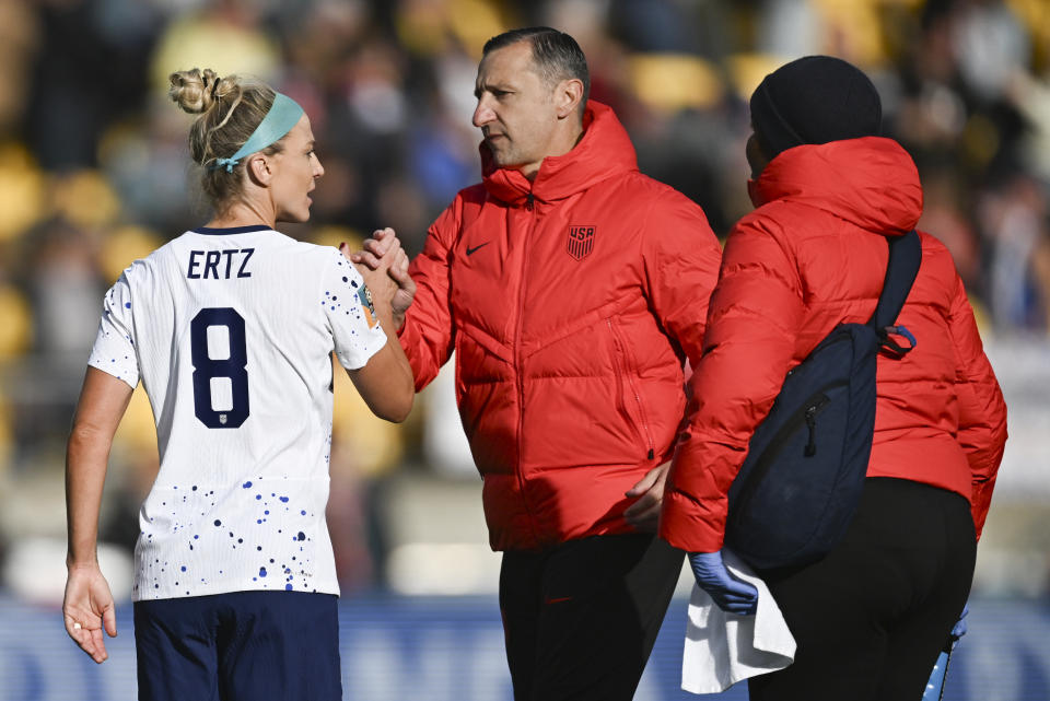 United States' head coach Vlatko Andonovski gestures to Julie Ertz, left, following the Women's World Cup Group E soccer match between the United States and the Netherlands in Wellington, New Zealand, Thursday, July 27, 2023. (AP Photo/Andrew Cornaga)