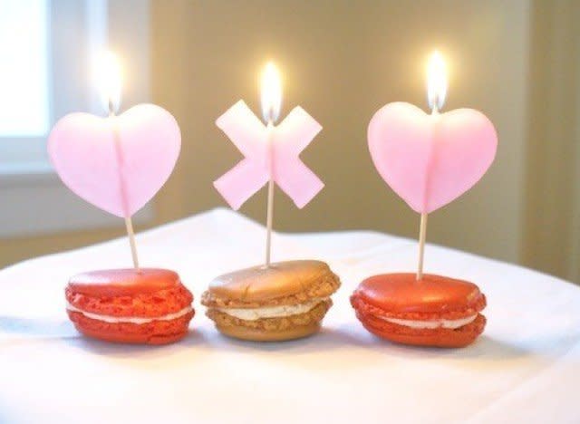 A romantic setting is incomplete without a touch of candles to set the mood. Whether you're looking to use <a href="http://www.huffingtonpost.com/2013/02/05/valentines-day-ideas-candles_n_2602392.html?utm_hp_ref=valentines-day-ideas">these do-it-yourself wax hearts</a> for a party or as features for an intimate evening, <a href="http://www.hellolucky.com/wordpress/2013/01/18/diy-valentines-day-candles/">Hello Lucky's</a> craft is sure to help.  Head over to <a href="www.huffingtonpost.com/news/valentines-day-ideas">Valentine's Day ideas</a> for more inspiration.