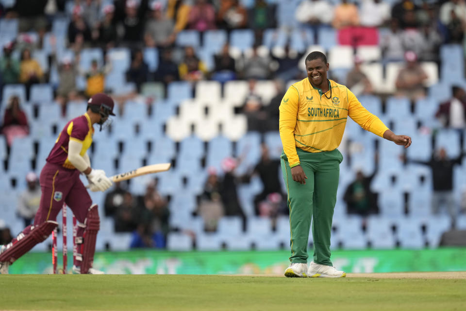 South Africa's bowler Sisanda Magala, right, celebrates after bowling West Indies's batsman Brandon King for 23 runs during the first T20 cricket match between South Africa and West Indies, at Centurion Park, South Africa, in Pretoria, South Africa, Saturday, March 25, 2023. (AP Photo/Themba Hadebe)