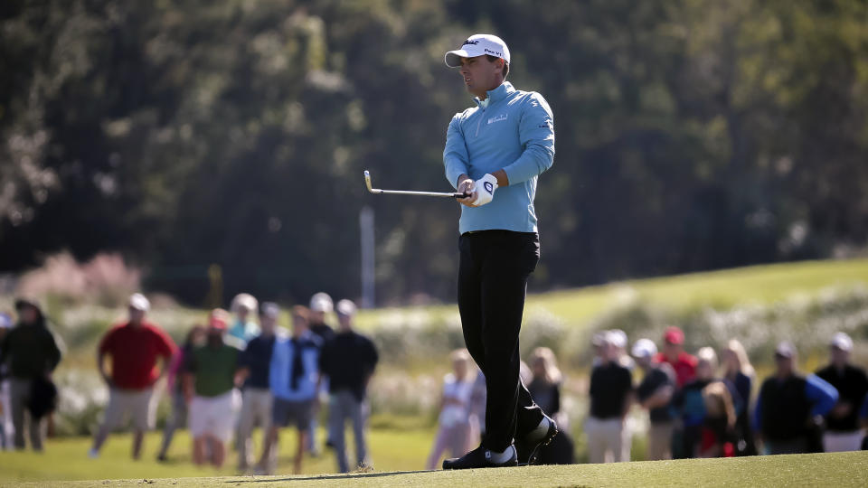 Charles Howell III watches his chip shot onto the second green during the third round of the RSM Classic golf tournament on Saturday, Nov. 17, 2018, in St. Simons Island, Ga. (AP Photo/Stephen B. Morton)