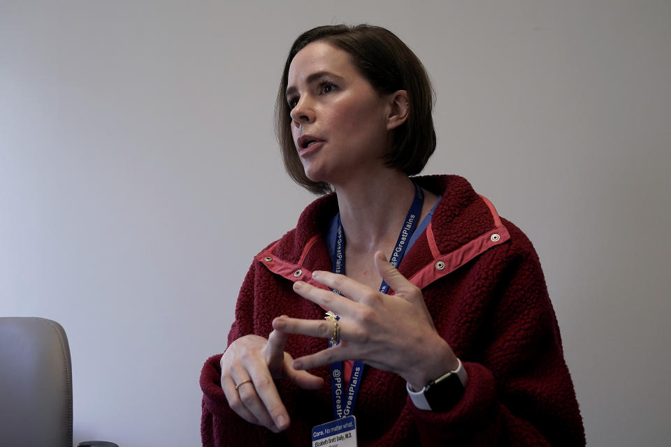 Dr. Elizabeth Brett Daily talks about about the medical abortion process at a Planned Parenthood clinic where she works, Wednesday, Oct. 12, 2022, in Kansas City, Kan. (AP Photo/Charlie Riedel)