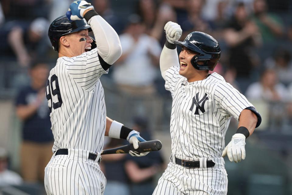 Anthony Volpe (right) and Aaron Judge should help keep the Yankees in the thick of what should be a competitive AL East race.