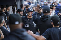 Chicago White Sox's Korey Lee (26) is congratulated after scoring against the Toronto Blue Jays during the second inning of a baseball game Tuesday, May 21, 2024, in Toronto. (Christopher Katsarov/The Canadian Press via AP)