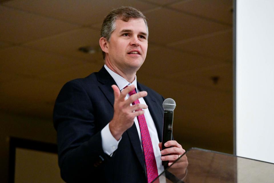 Zach McCluskey, CEO of HCA Florida Fort Walton-Destin Hospital, talks about the hospital's new name along with the renaming of HCA Florida Twin Cities Hospital during the Greater Fort Walton Beach Chamber of Commerce's First Friday Coffee at the First Baptist Church of Fort Walton Beach.