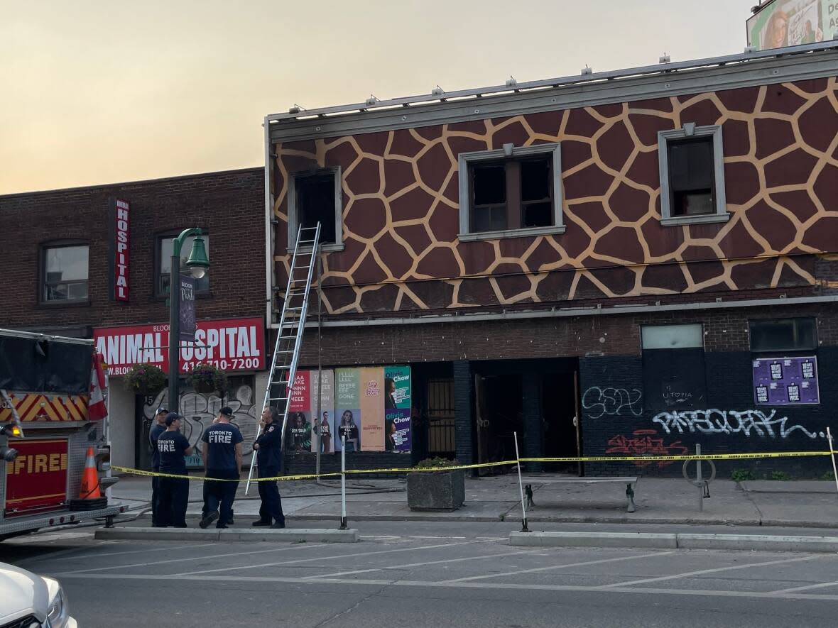 Toronto firefighters were still at the scene of this fatal fire on Wednesday evening doing a fire watch. (Patrick Morrell/CBC - image credit)