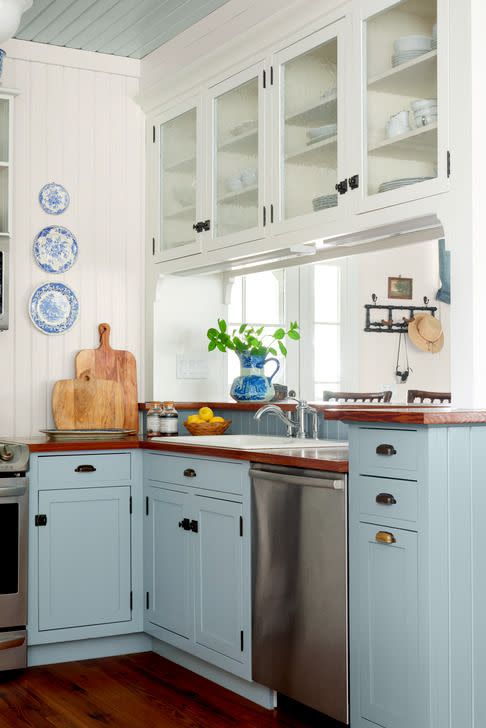 beach house kitchen with sky blue cabinets