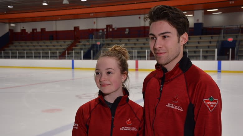 At Montreal rink, fellow skaters and the Zamboni driver celebrate Virtue and Moir's victory