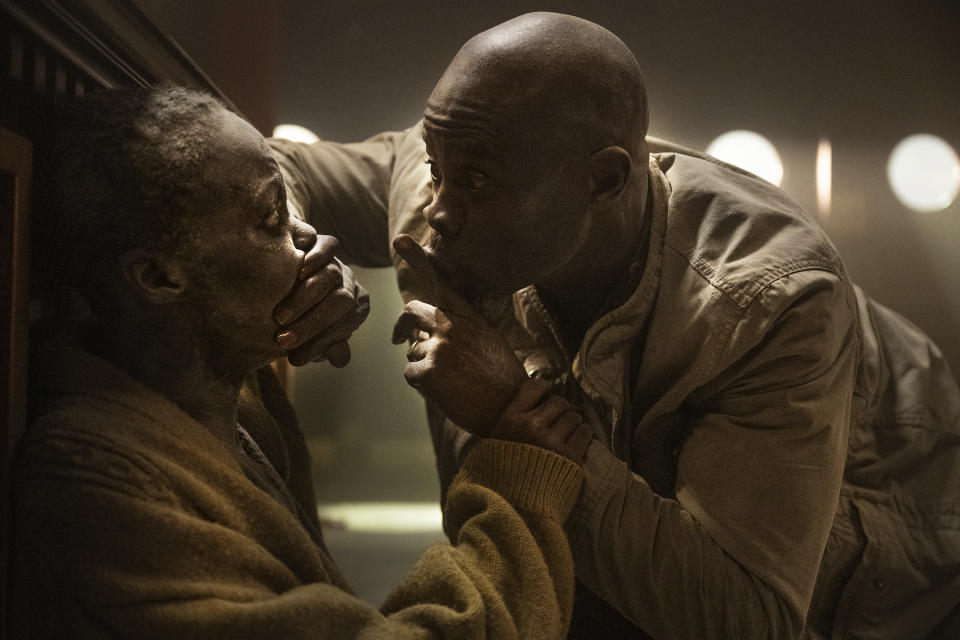 This image released by Paramount Pictures shows Lupita Nyong'o, left, and Djimon Hounsou in a scene from "A Quiet Place: Day One." (Gareth Gatrell/Paramount Pictures via AP)