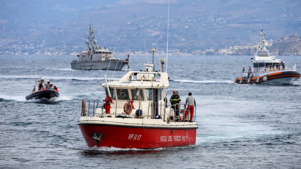 Rescue boats join a search operation off the coast of Porticello on Wednesday. - Louiza Vradi/Reuters