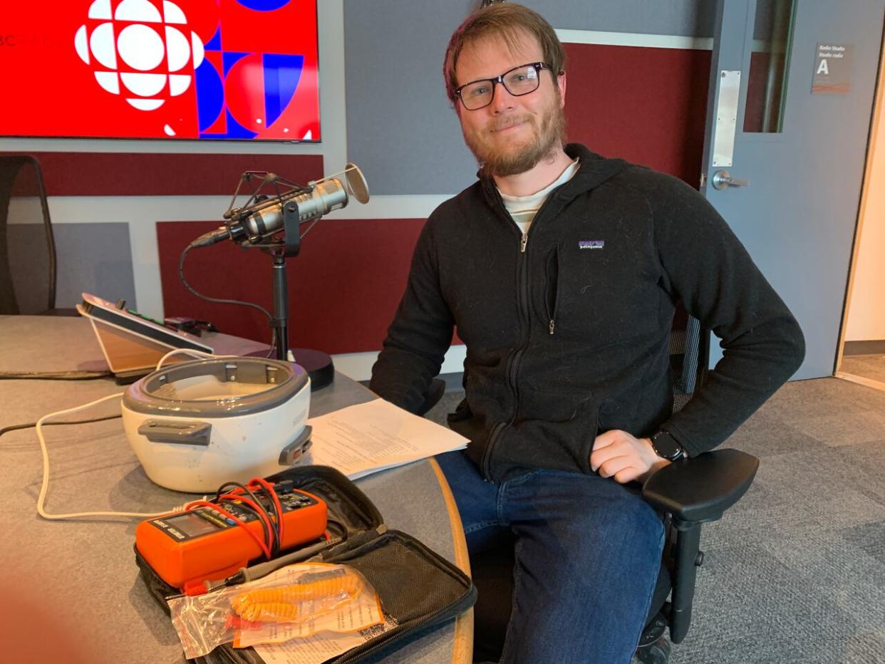 Daniel O'Keeffe, a volunteer with the St. John's Tool Library, was able to save his broken rice cooker from the landfill with a small repair. (Heather Barrett/CBC - image credit)