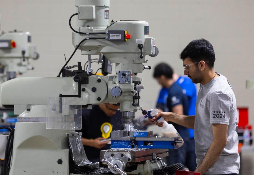 A student competes during the precision machining contest of the 2024 Skills Ontario Competition in Toronto, Ontario, Canada, on May 6, 2024. The 2024 Skills Ontario Competition kicked off here on Monday, attracting more than 2,800 competitors. A broad range of skills and careers are represented during the three-day competition from the manufacturing, construction, service, and technology sectors. (Photo by Zou Zheng/Xinhua via Getty Images)