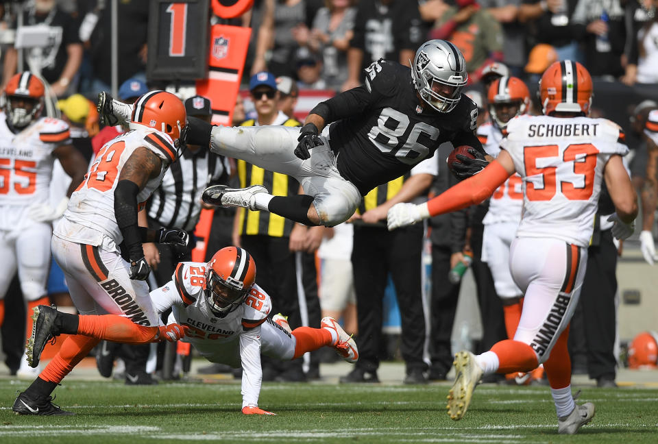 <p>Lee Smith #86 of the Oakland Raiders gets tackled by E.J. Gaines #28 of the Cleveland Browns during the second quarter of their NFL football game at Oakland-Alameda County Coliseum on September 30, 2018 in Oakland, California. (Photo by Thearon W. Henderson/Getty Images) </p>