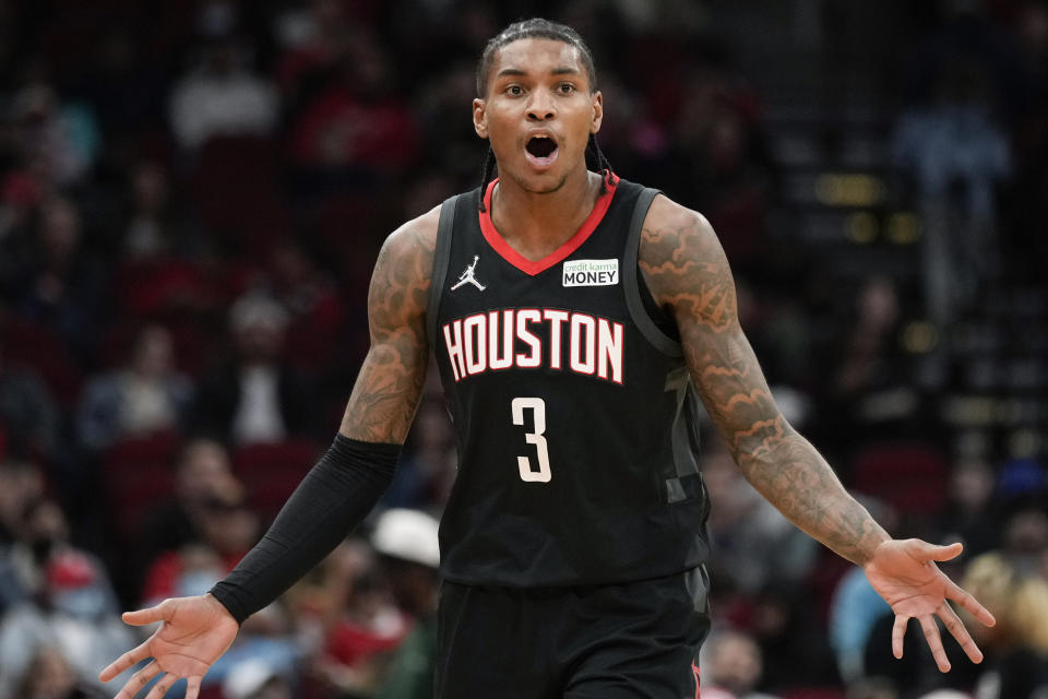 Houston Rockets guard Kevin Porter Jr. questions an official's call during the first half of an NBA basketball game against the San Antonio Spurs, Tuesday, Jan. 25, 2022, in Houston. (AP Photo/Eric Christian Smith)