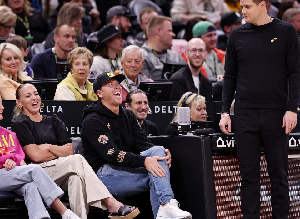 Jazz owners Ryan and Ashley Smith laugh at something head coach Will Hardy said during Jazz-Nuggets game.