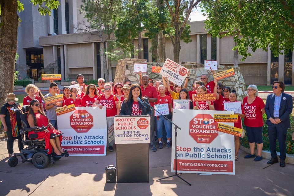Beth Lewis, the executive director of Save Our Schools Arizona, starts the press conference as Save Our Schools Arizona drops off over 141,000 signatures in favor of deferring the statewide voucher program to the ballot in the 2024 election at the Arizona Capitol in Phoenix on Friday, Sept. 23, 2022.