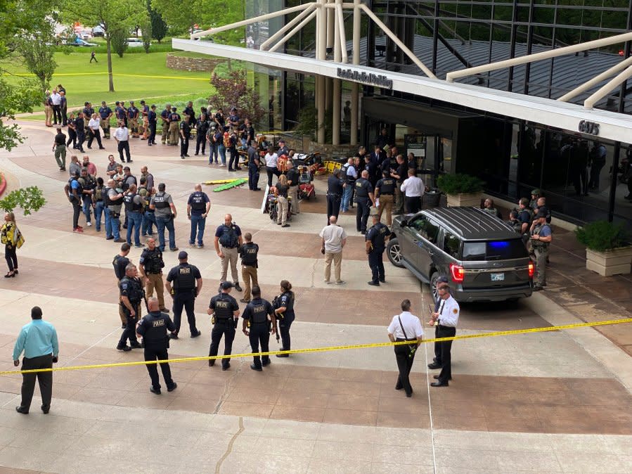 Emergency personnel respond to a shooting at the Natalie Medical Building on the St. Francis Hospital campus Wednesday, June 1, 2022 in Tulsa, Okla. (Ian Maule/Tulsa World via AP)