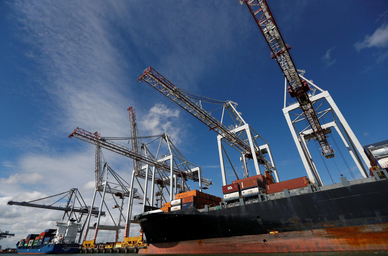 Shipping containers are stacked on a cargo ship in the dock at the ABP port in Southampton, Britain August 16, 2017. Picture taken August 16, 2017.  REUTERS/Peter Nicholls