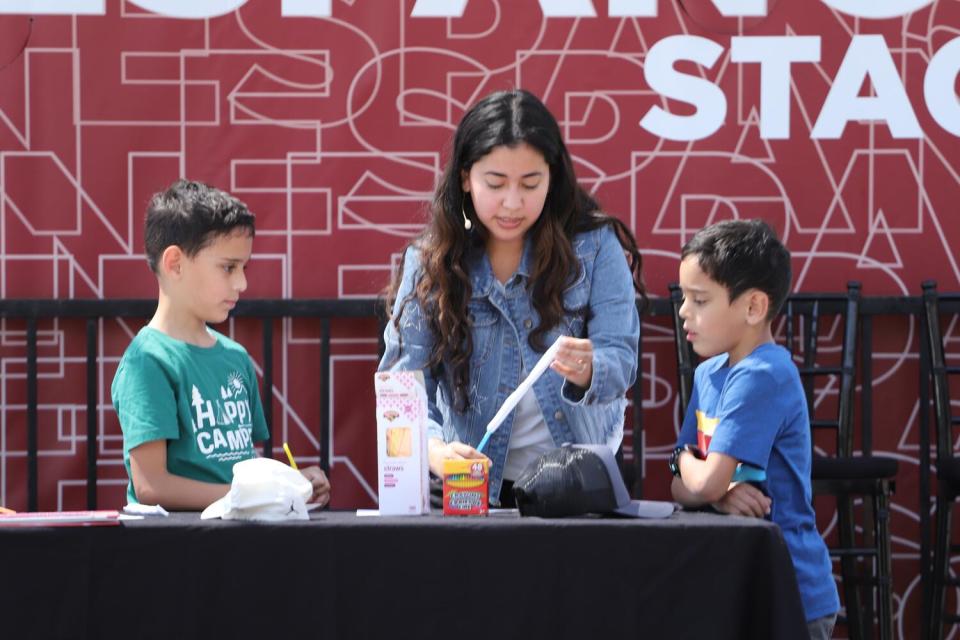 Zaida Hernandez makes a rocket at the Los Angeles Times en Espanol stage