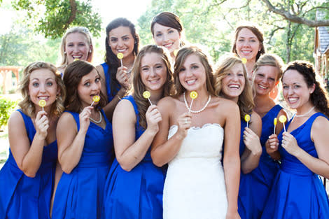 Heaven forbid you steal this bride's coordinated lollipop idea.