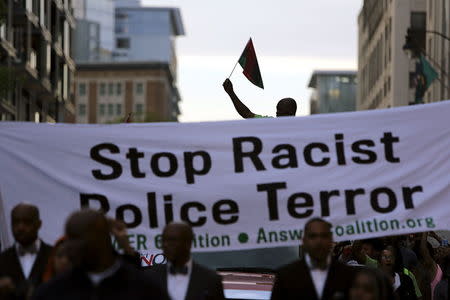 Protesters against police violence march towards the White House in Washington, April 29, 2015. REUTERS/Jonathan Ernst