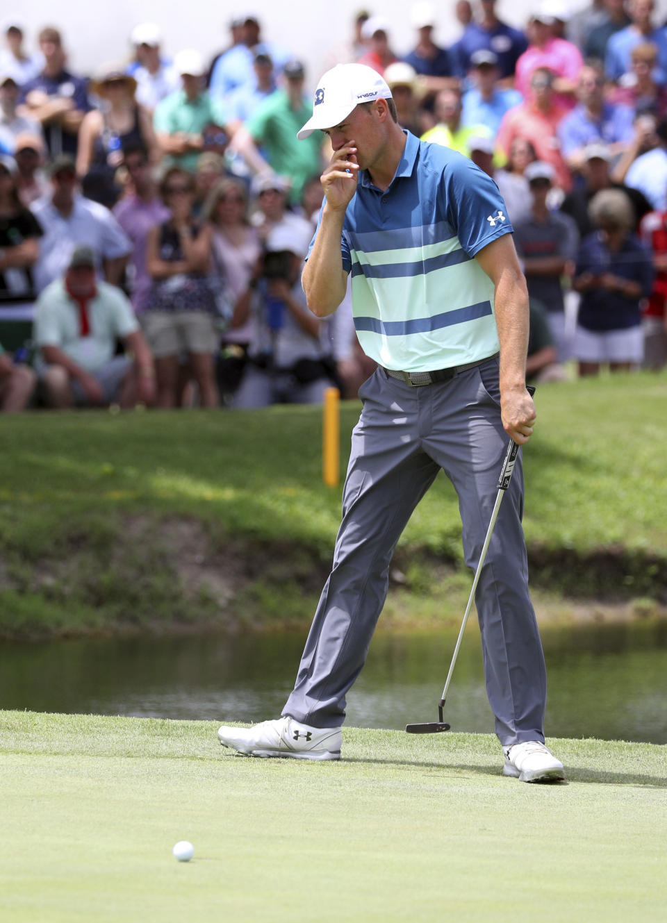 Jordan Spieth reacts after a missed putt on the ninth green in the final round of the Charles Schwab Challenge golf tournament Sunday, May 26, 2019 in Fort Worth, Texas. (AP Photo/ Richard W. Rodriguez)