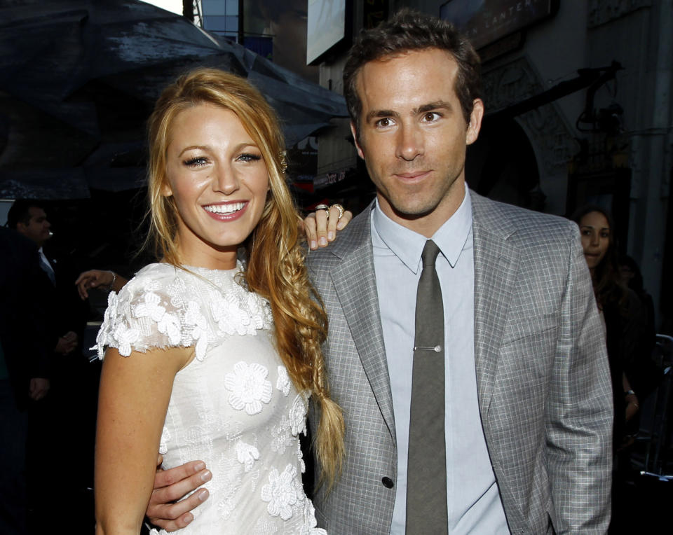 FILE - This June 15, 2011 file photo shows actors Blake Lively, left, and Ryan Reynolds at the premiere of "Green Lantern" in Los Angeles. Reynolds wed Blake Lively in Mount Pleasant, S.C., Sunday, Sept. 9, 2012, at Boone Hall Plantation, according to a person familiar with the ceremony who requested anonymity because they were not authorized to speak on the matter. While it's Lively's first marriage, Reynolds was previously married to Scarlett Johansson. Their divorce was finalized last summer after three years of marriage. Lively and Reynolds both starred in last year's “Green Lantern.” (AP Photo/Matt Sayles, file)