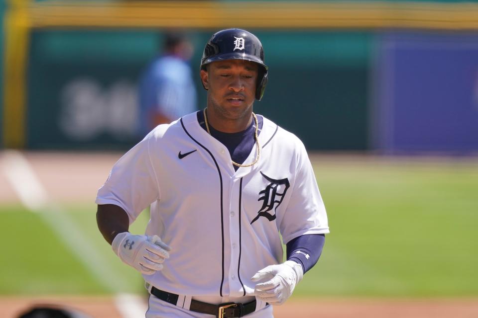 Tigers second baseman Jonathan Schoop scores after a solo home run during the first inning on Wednesday, Aug. 12, 2020, at Comerica Park.