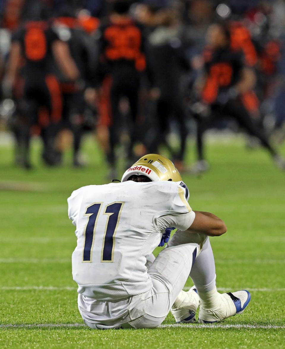 Hoban defensive back Elbert Hill IV reacts after the loss to Massillon in the Division II state championship game Thursday.