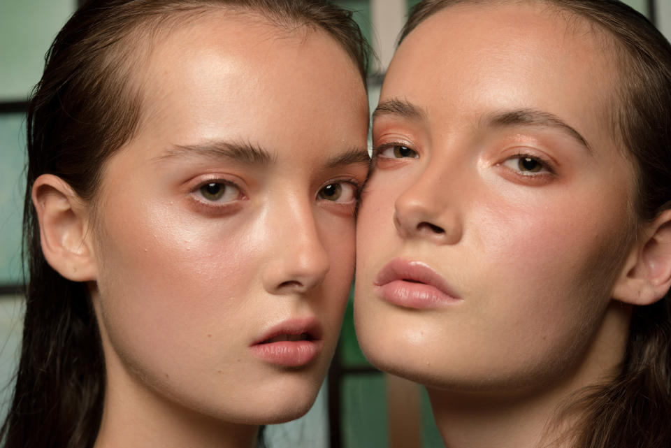 <p>A beautiful close up of the dewy skin and bronze lids backstage at Katie Ann McGuigan.<em> [Photo: PA]</em> </p>