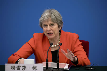 British Prime Minister Theresa May speaks during the inaugural meeting of the UK-China CEO Council at the Great Hall of the People in Beijing, China January 31, 2018. REUTERS/Mark Schiefelbein/Pool