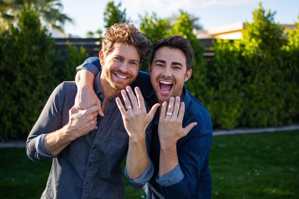 Vaughan (left) wrote an original song to propose to Bennett, and planned the engagement under the pretense of a holiday greeting card photo shoot.  (Photo: Andrew Herner )