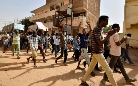 Sudanese demonstrators chant slogans as they participate in anti-government protests in Khartoum, Sudan January 17, 2019. REUTERS/Mohamed Nureldin Abdallah