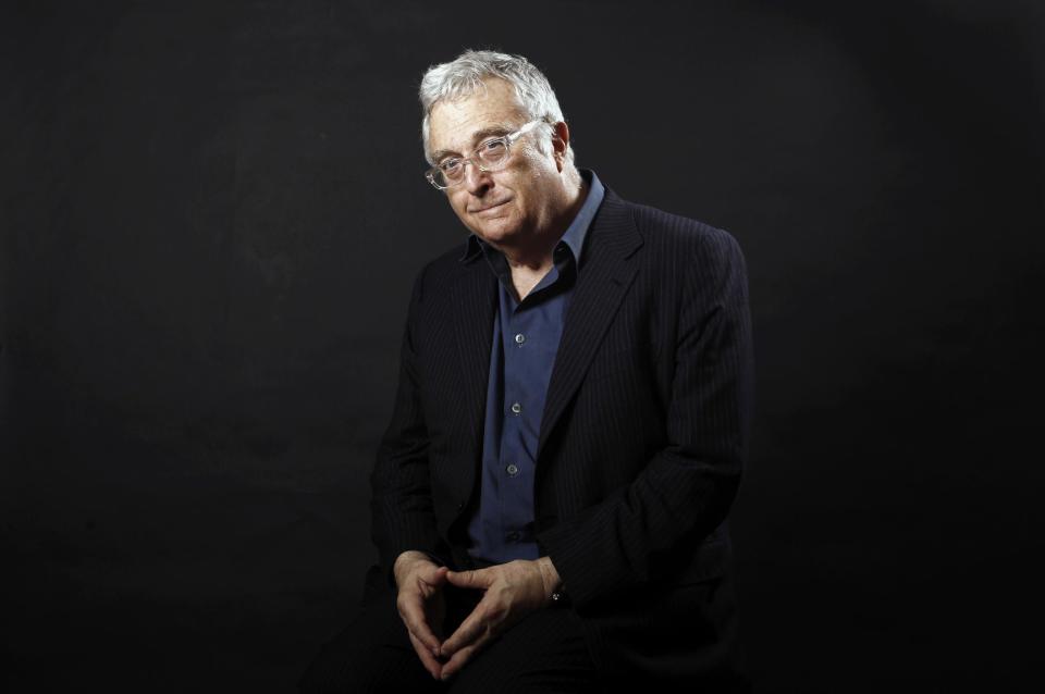 FILE - This Feb. 7, 2011 file photo shows musician Randy Newman posing after the Academy Award Nominees Luncheon in Beverly Hills, Calif. Newman is one of eight inductees to the Rock and Roll Hall of Fame, which also include rockers Heart and Rush, the late Donna Summer, rap group Public Enemy and bluesman Albert King, and Quincy Jones, this year's Ahmet Ertegun lifetime achievement honorees. (AP Photo/Matt Sayles, file)