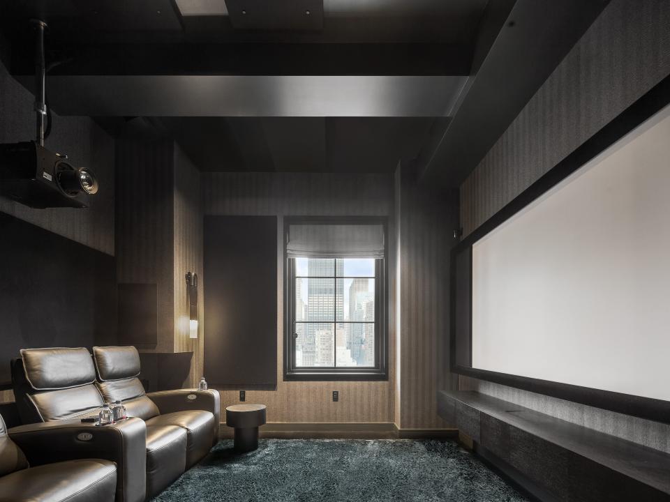 The private movie theater in Penthouse A at Stella Tower