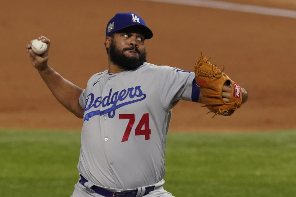 Los Angeles Dodgers relief pitcher Kenley Jansen throws against the Tampa Bay Rays during the ninth inning in Game 3 of the baseball World Series Friday, Oct. 23, 2020, in Arlington, Texas. (AP Photo/Tony Gutierrez)