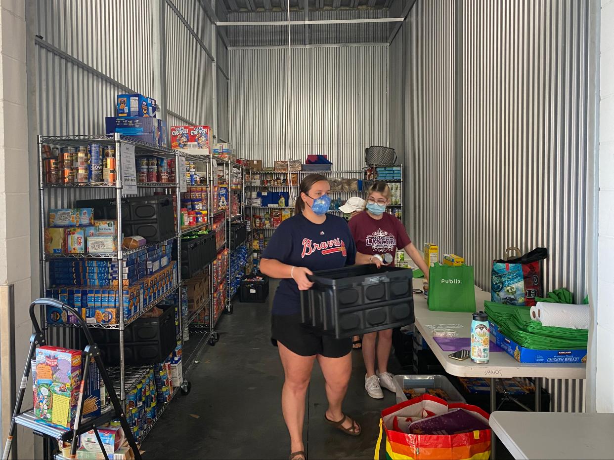 Emily Lartigue started a food bank for Disney employees who have been laid-off or furloughed during the pandemic.  (Richard Hall / The Independent)