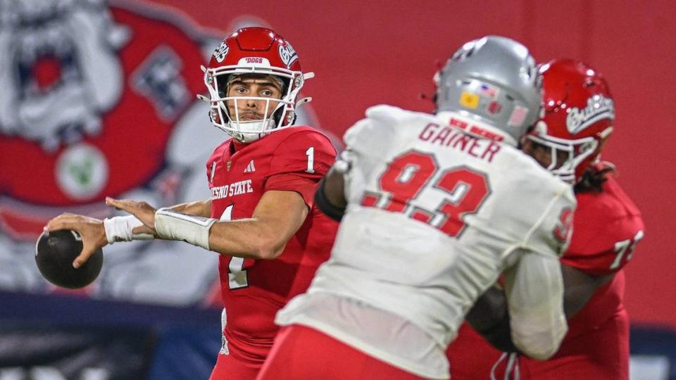 Fresno State quarterback Mikey Keene looks to throw a pass in the Bulldogs’ 25-17 loss to the Lobos at Valley Children’s Stadium on Saturday, Nov. 18, 2023.