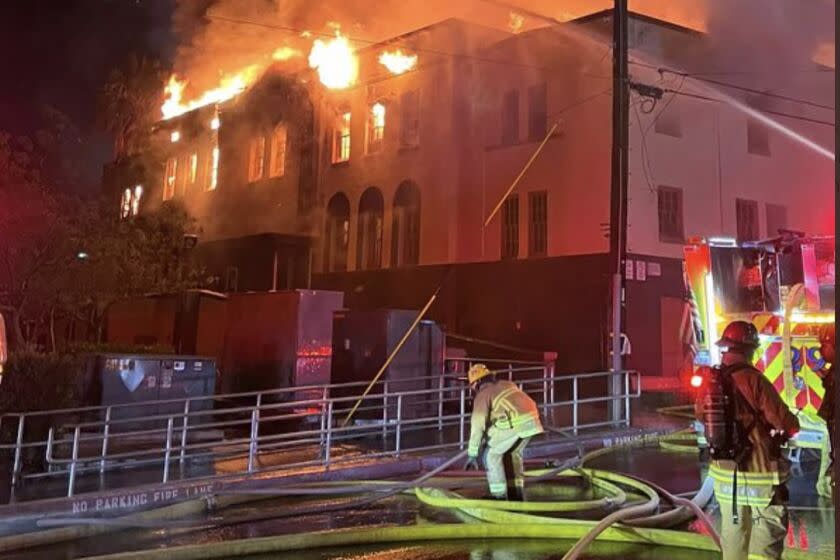 Firefighters battle a blaze that destroyed Santa Paula high school gym