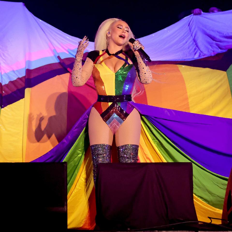 For her ballad "Beautiful," Aguilera donned a flowing cape resembling the Pride flag. The cape was so large that her back-up dancers had to hold it up for her.