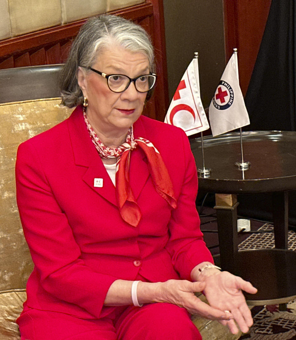 Kate Forbes, President of the International Federation of Red Cross and Red Crescent Societies, speaks with the Associated Press in Manila, Philippines, Wednesday, May 29, 2024. Authorities were searching on Wednesday for safer ground to relocate thousands of survivors at risk from a potential second landslide in the Papua New Guinea Highlands, while the arrival of heavy earth-moving equipment at the disaster site where hundreds are buried has been delayed until Thursday, officials said. (AP Photo/Joeal Calupitan)