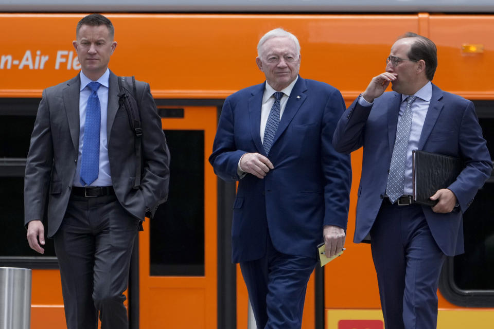 Dallas Cowboys owner Jerry Jones, center, arrives at federal court Monday, June 17, 2024, in Los Angeles. Jones is expected to testify in a class-action lawsuit filed by "Sunday Ticket" subscribers claiming the NFL broke antitrust laws. (AP Photo/Damian Dovarganes)