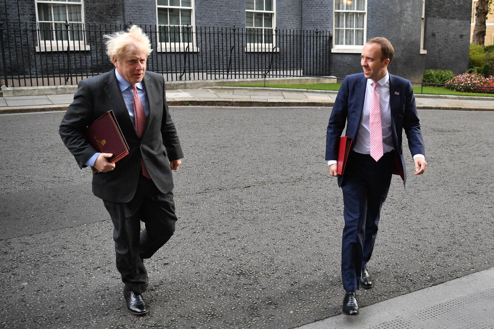 LONDON, ENGLAND - SEPTEMBER 30: Prime Minister, Boris Johnson and Secretary of State for Health and Social Care, Matt Hancock walk from Downing Street for the weekly cabinet meeting to be held in the Foreign and Commonwealth Office on September 30, 2020 in London, England. (Photo by Leon Neal/Getty Images)